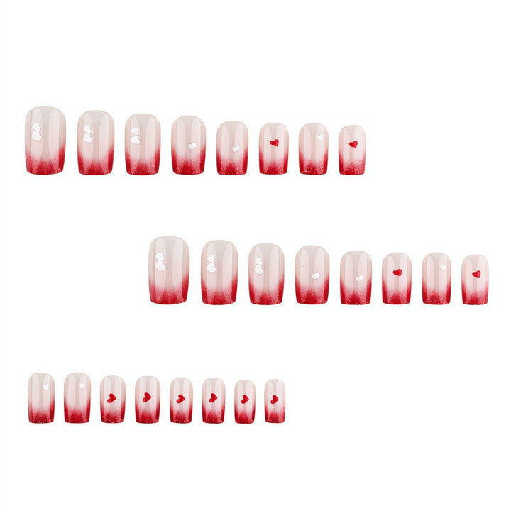 Romantic Nail Art with Heart Motifs Stornfield