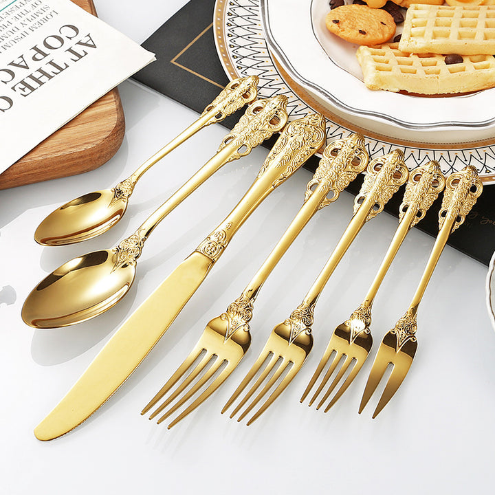 Elegant fish fork with artistic handle design Stornfield