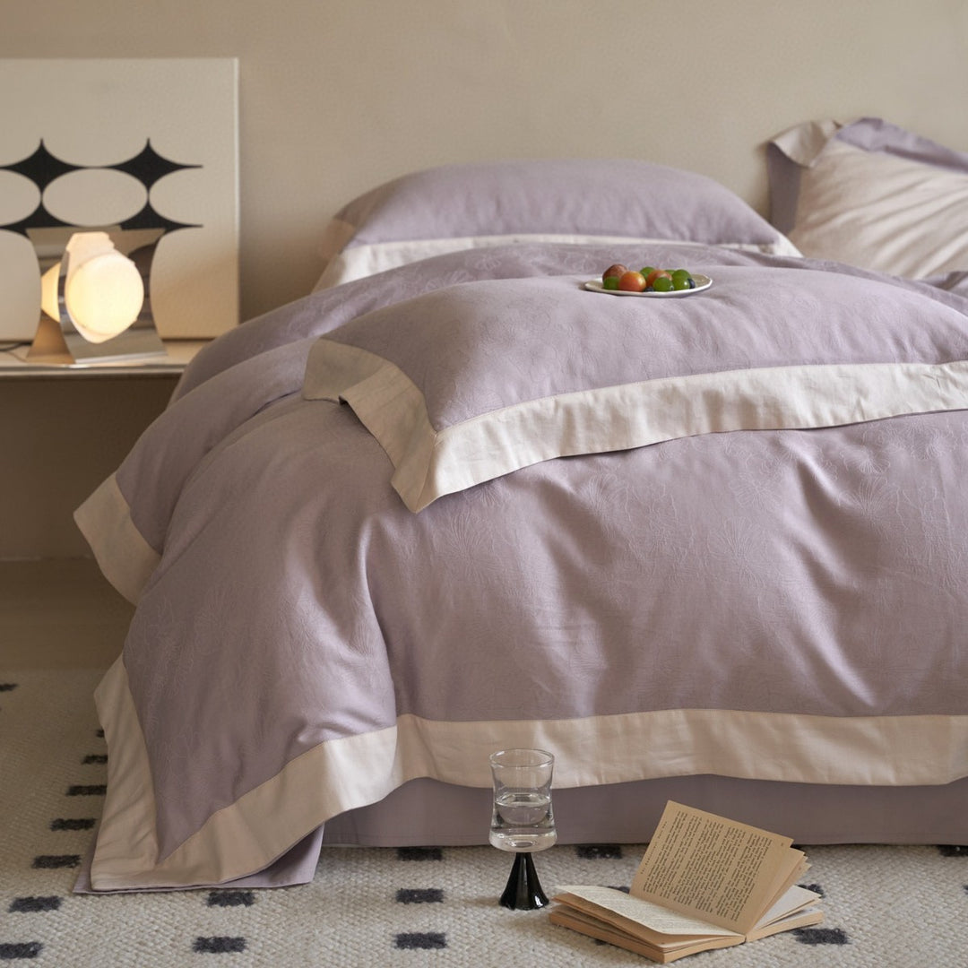 High-quality bedding set made of cotton satin with jacquard floral relief and contrasting hem finishing