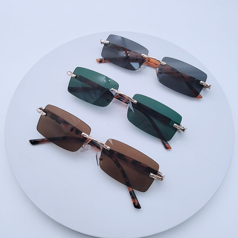 Women's fashionable rectangular sunglasses with unique design feature Stornfield
