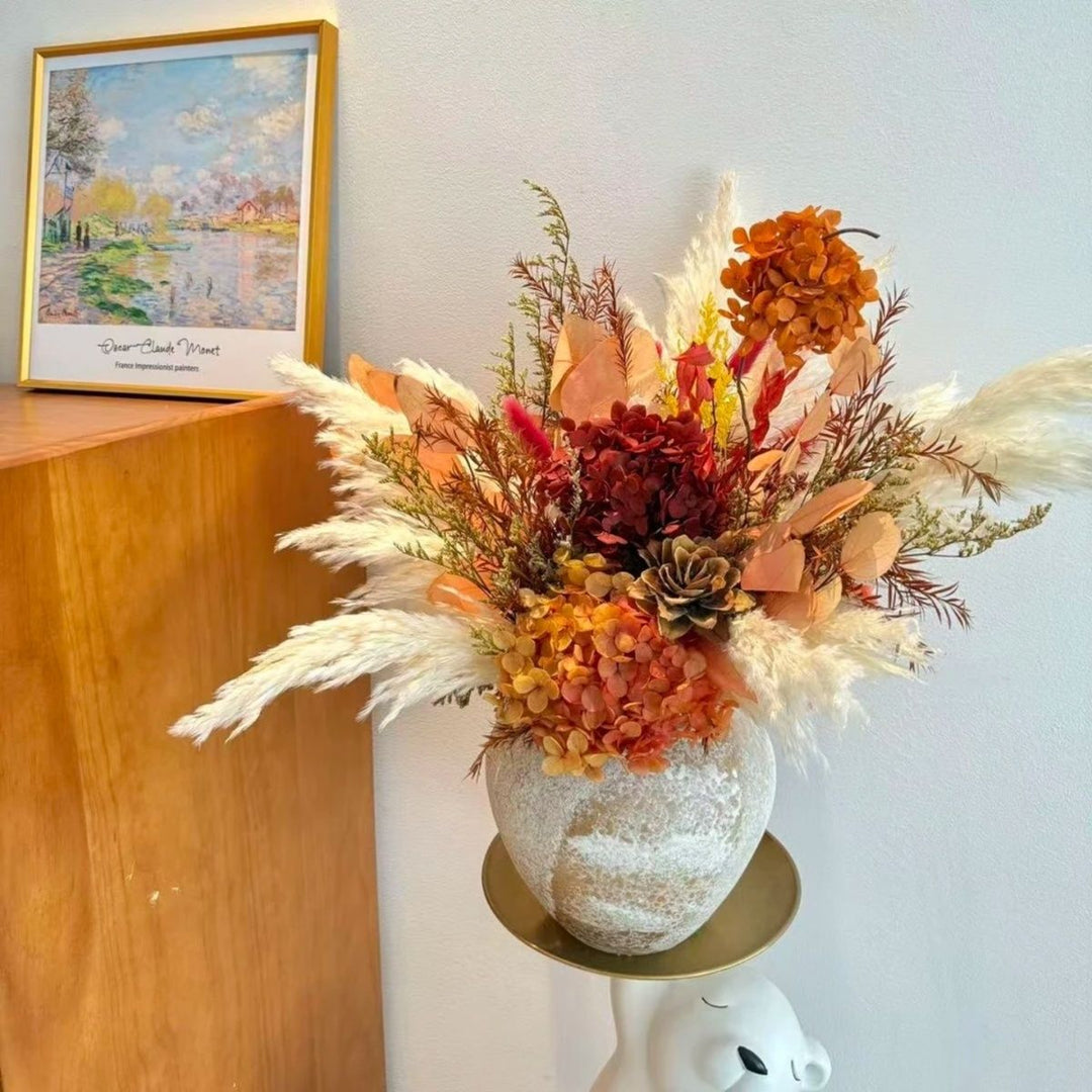 Dried Floral Arrangement with Decorative Accents