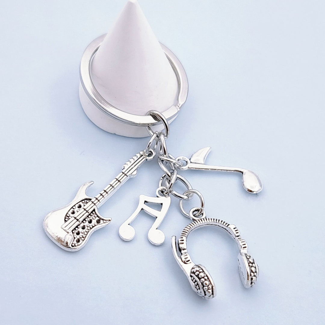 Keychain with musical instruments motifs Stornfield