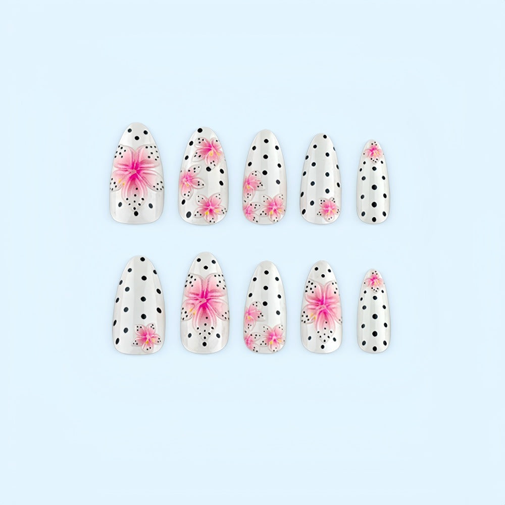 Artificial nail set with floral accents and polka dots Stornfield