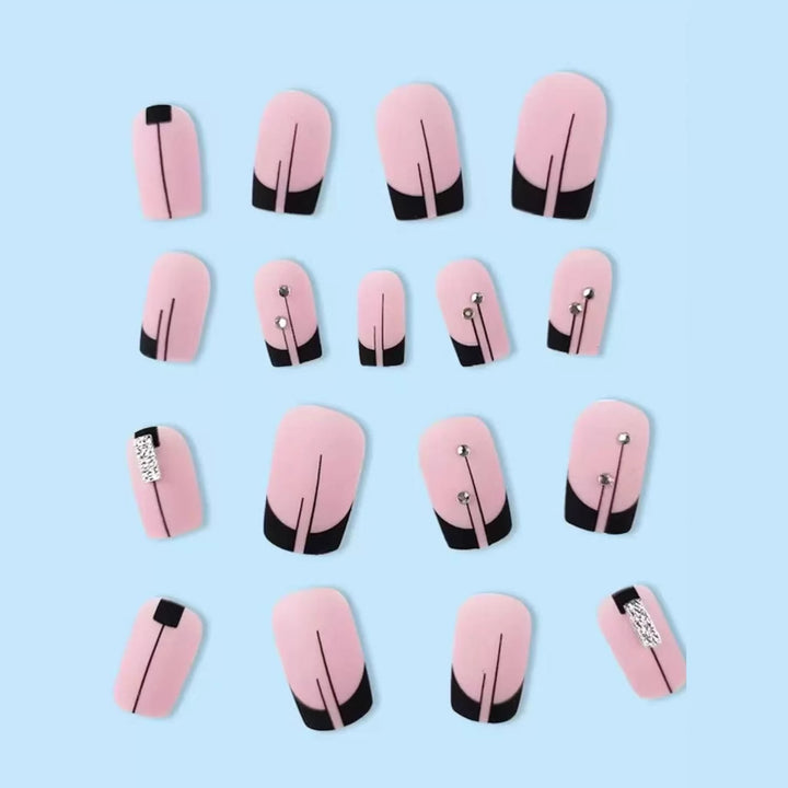 Acrylic nail set with elegant rhinestone accents and stylish lines Stornfield
