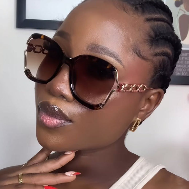 Ladies fashionable sunglasses with golden chain details Stornfield
