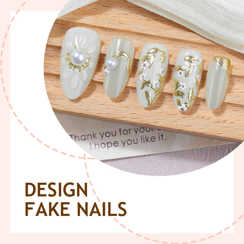 Artificial nail set with elegant flower and pearl decorations Stornfield