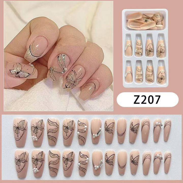 Artificial nails with filigree butterfly design Stornfield