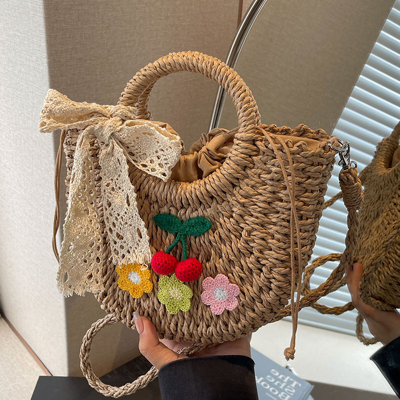 Handcrafted Floral Accent Straw Handbag