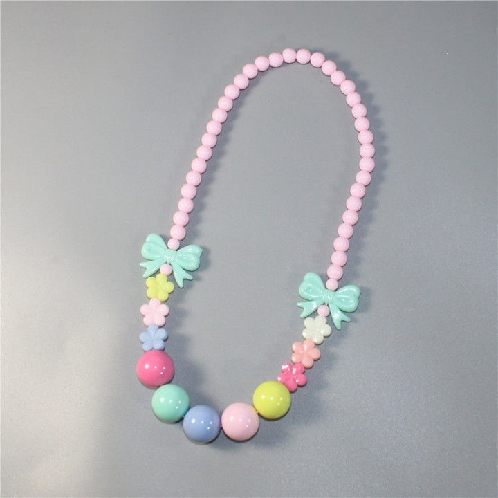 Colorful pearl necklace with floral elements Stornfield
