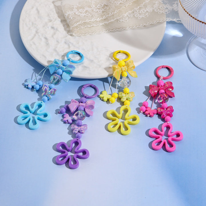 Playful keychain with flower and butterfly details Stornfield