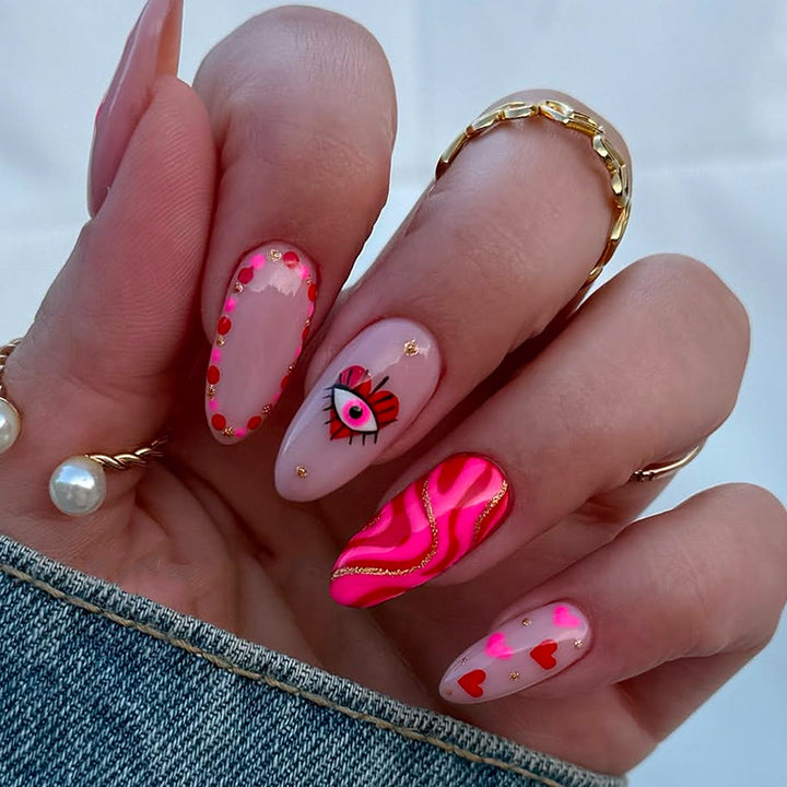 Creative heart and eye designs artificial nails Stornfield
