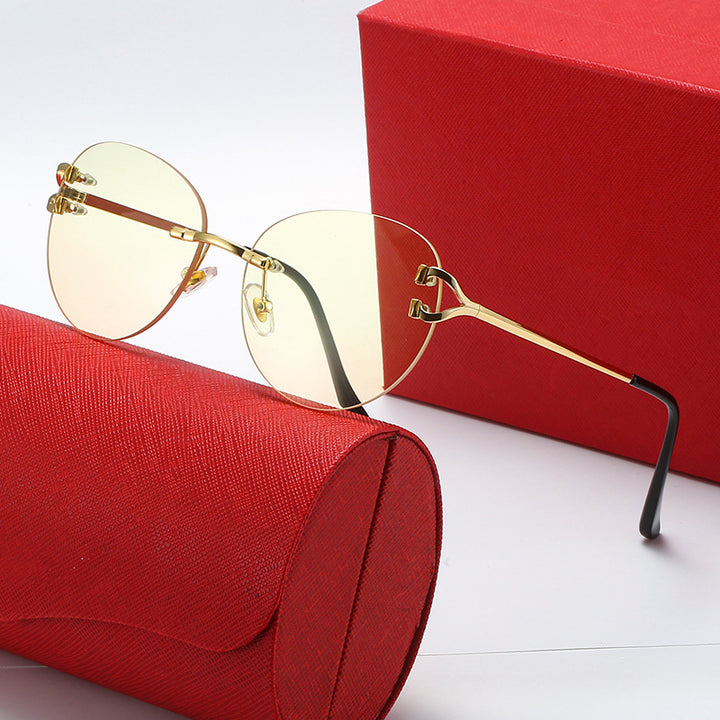 Ladies elegant Cat-Eye sunglasses with gold accents and UV protection Stornfield