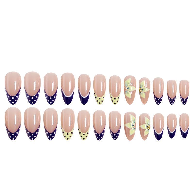 Artful nail tips with floral accent Stornfield