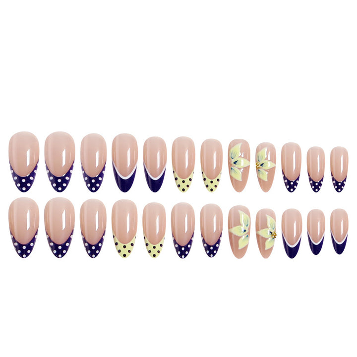 Artful nail tips with floral accent Stornfield
