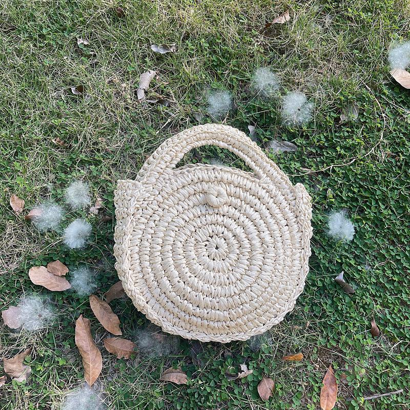 Handcrafted Round Wicker Bag with Elegant Closure Stornfield