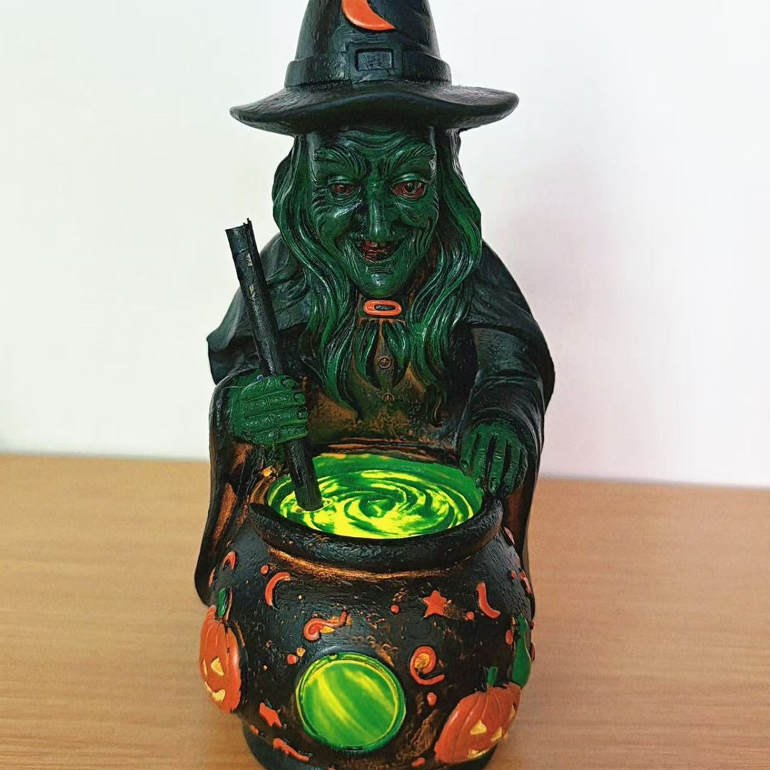Decorative witch figure with cauldron Stornfield