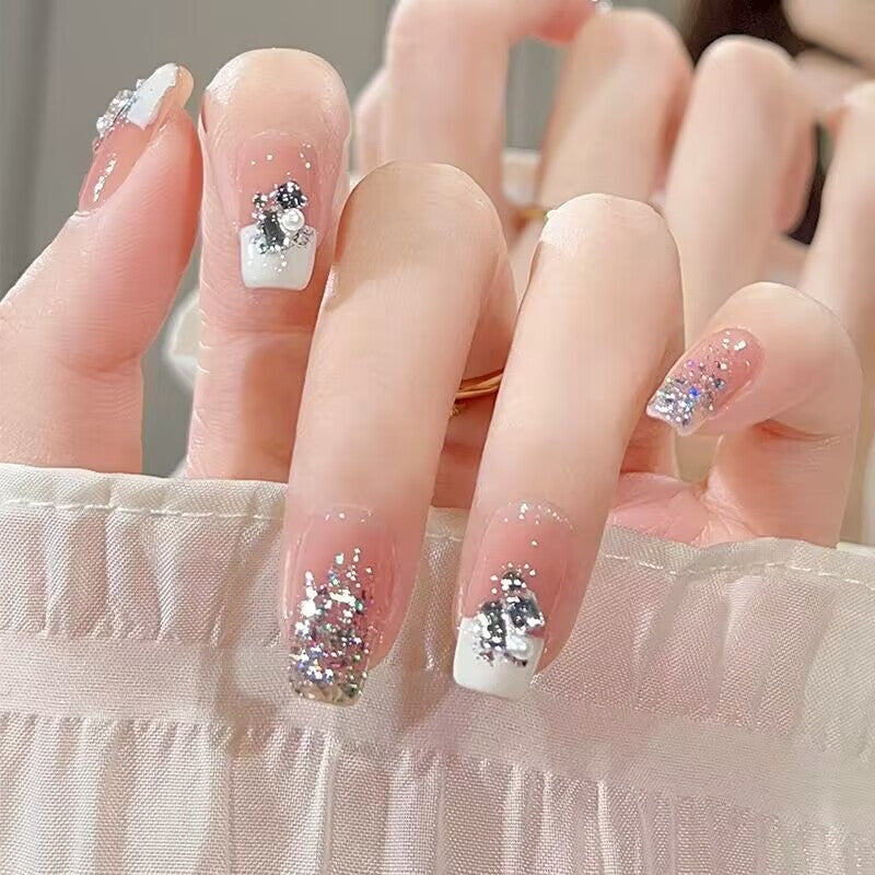 Decorative Press-On Nail Extensions with Floral Accents Stornfield