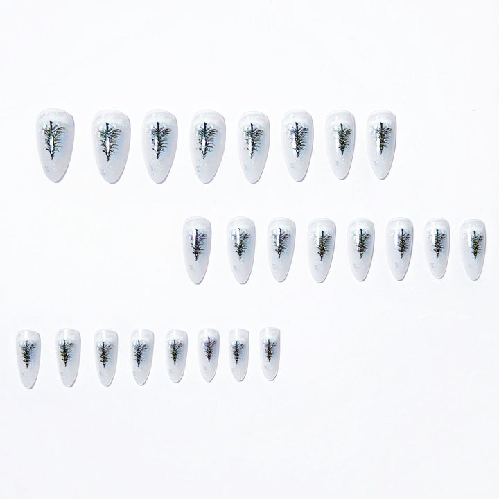 Elegant artificial nails with wintery Christmas tree motif Stornfield