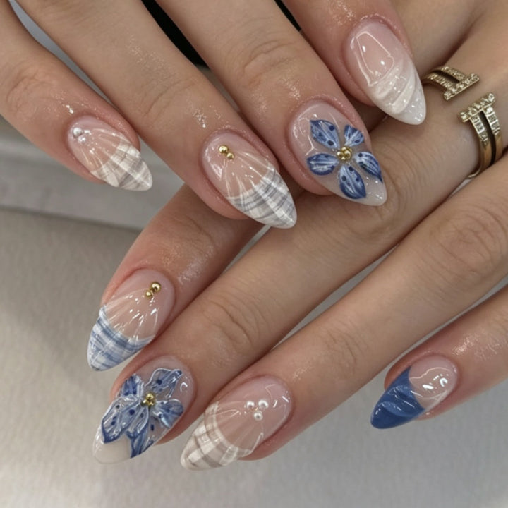 Artificial nails with floral design and elegant tips Stornfield