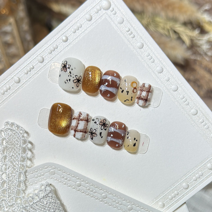 Artistic Press-On Nail Set with Unique Design Elements Stornfield