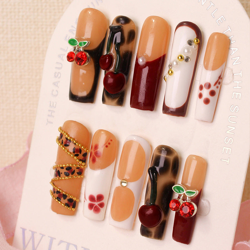 Nail art set with luxurious cherry and glitter accents Stornfield