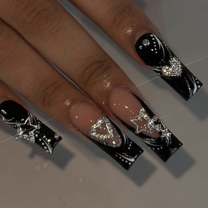 Artistic Long Press-On Nail Design with Rhinestone Accents Stornfield
