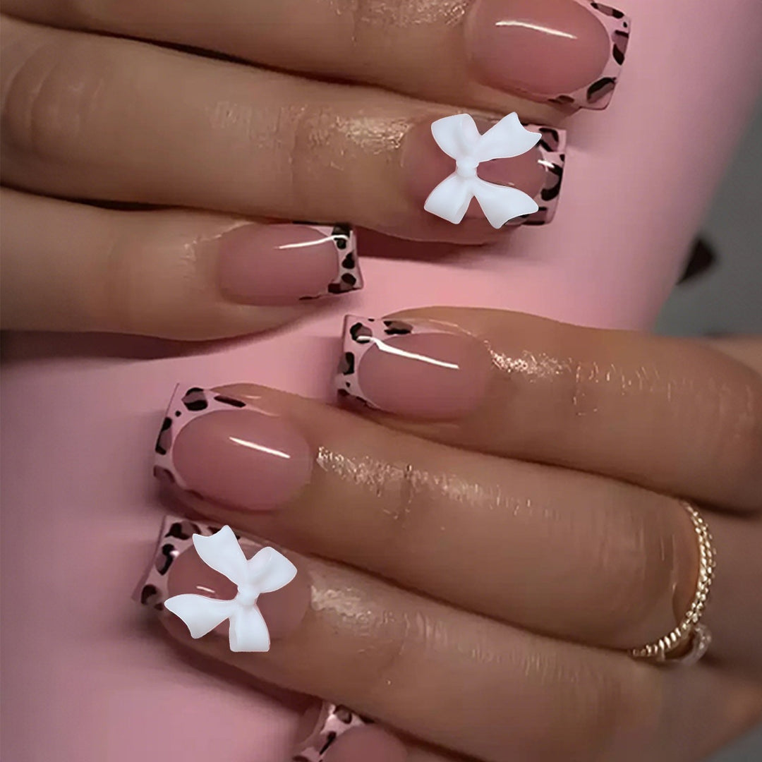 Acrylic nail set with colorful bows and leopard patterns Stornfield