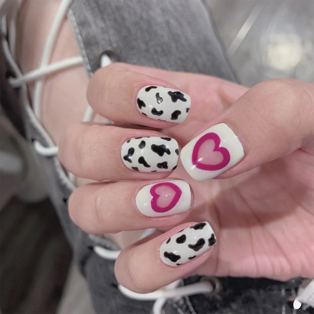 Creative nail art with heart and animal pattern motif Stornfield
