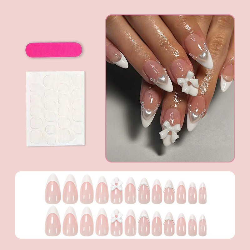 Art nail set with romantic bow and heart decorations Stornfield