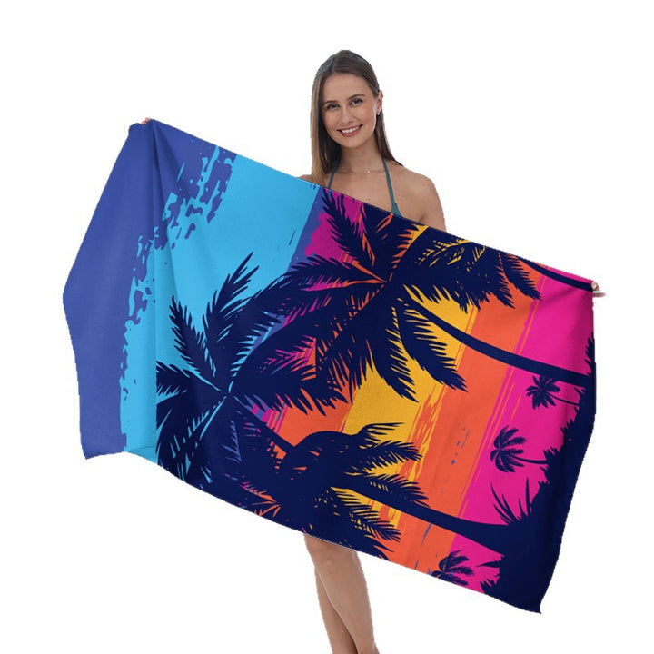 Beach towel with tropical palm leaf design Stornfield