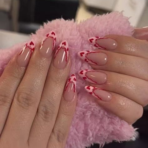 Acrylic nail set with elegant heart tips and creative accents Stornfield