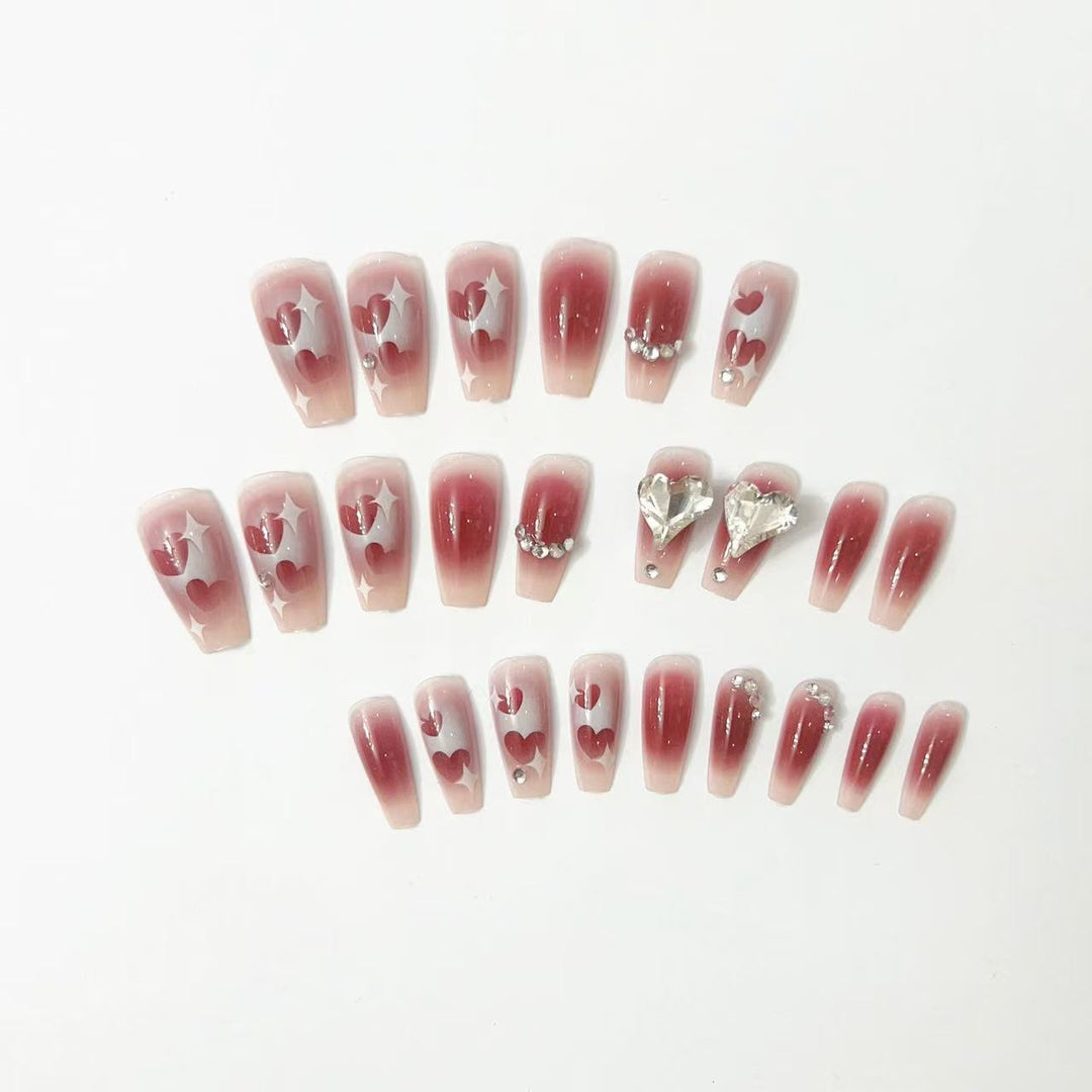 Artificial nails in romantic heart design Stornfield