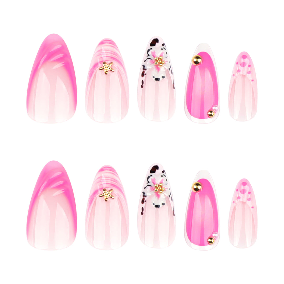 Artistic nail extensions with floral accents and glitter Stornfield