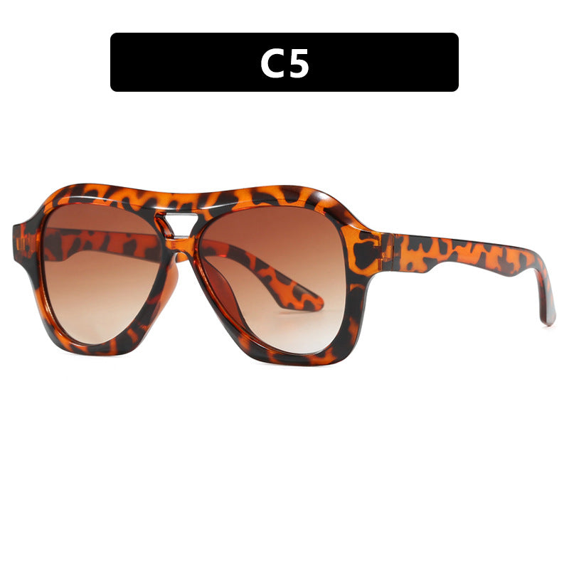 Ladies fashionable sunglasses in innovative design with wide frame Stornfield