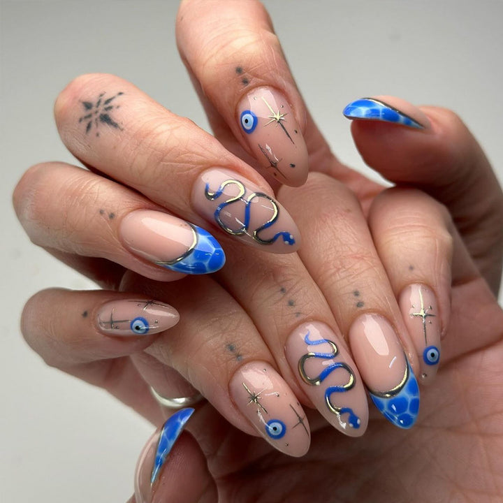 Artistic Stiletto Press-On Nails with Decorative Blue Elements Stornfield