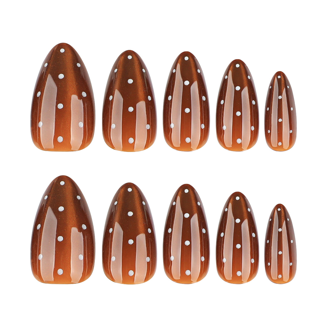 Artful nail extensions with glossy ombre effect and elegant dots Stornfield