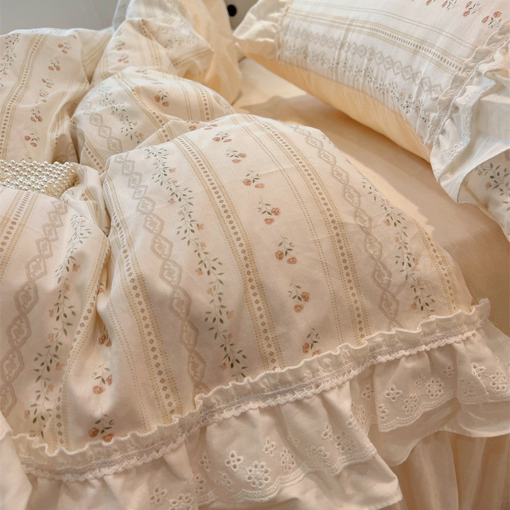 Romantic bedding set with lace ruffle, frills and fine rose stripe