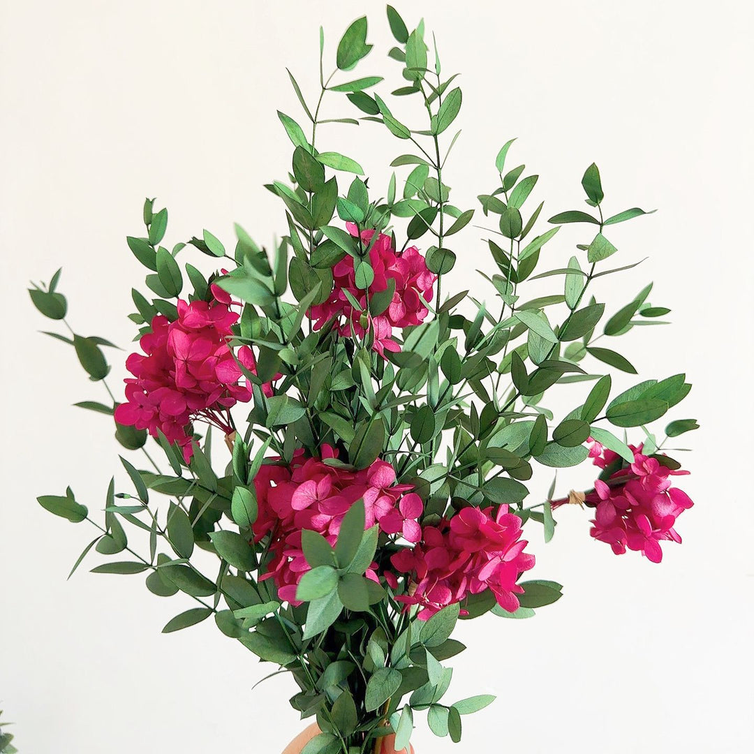 Lifelike Floral Bouquet with Green Foliage