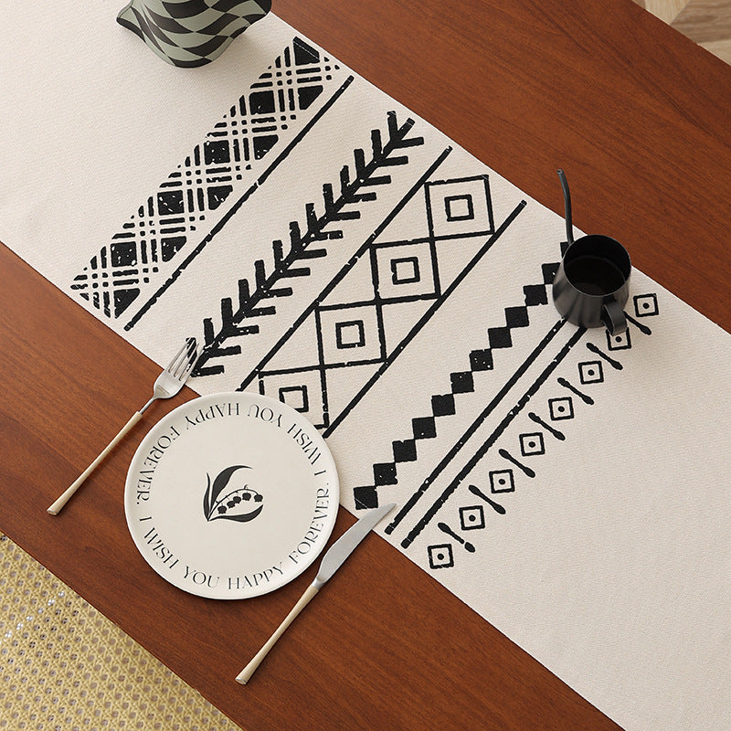 Woven table runner in Boho style with fringes and geometric ethnic print Stornfield