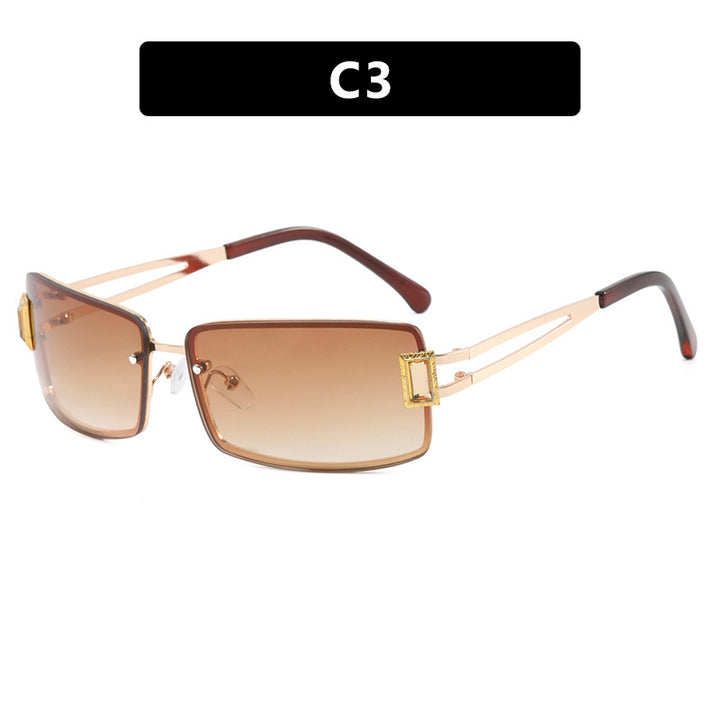 Ladies stylish sunglasses with elegant trapezoidal lenses and filigree metal frame Stornfield