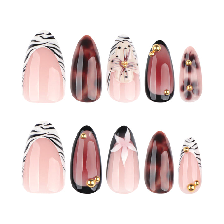 Nail Art with elegant flower design and glitter accents Stornfield