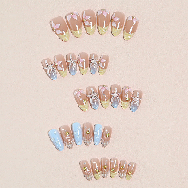 Artificial nails with floral motifs and glitter details Stornfield
