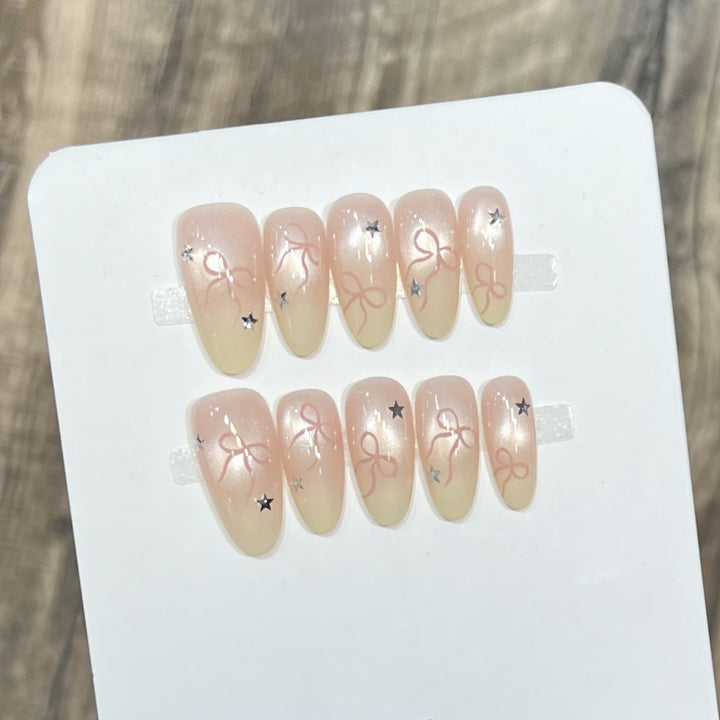 Elegant Stiletto Press-On Nail Set with Decorative Accents Stornfield