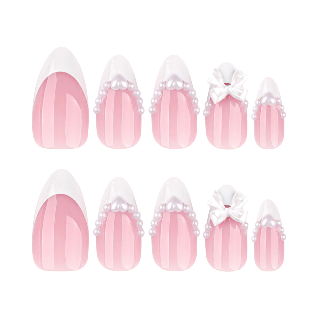 Artful Nail Extensions with Bead and Bow Designs Stornfield