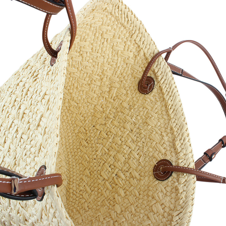 Elegant handbag made of woven natural material with sturdy leather handles Stornfield