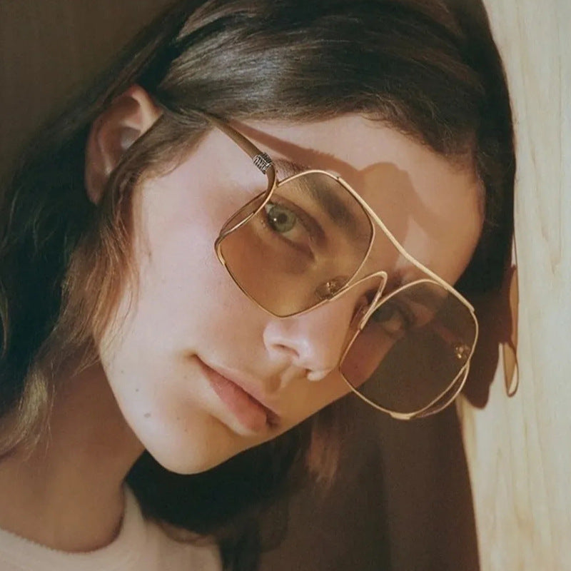 Women's geometric sunglasses with narrow metal frame and brown lenses Stornfield