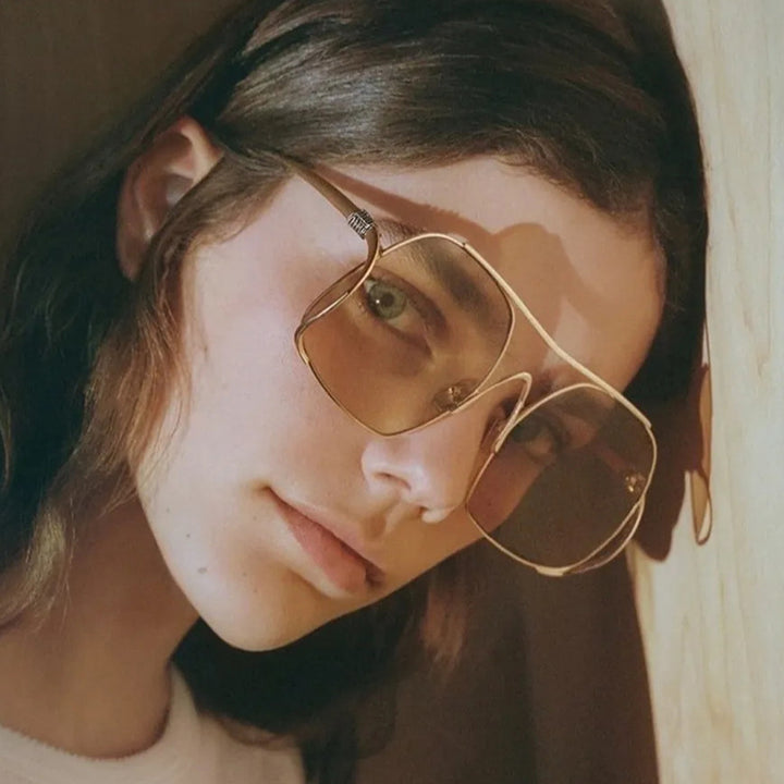 Women's geometric sunglasses with narrow metal frame and brown lenses Stornfield