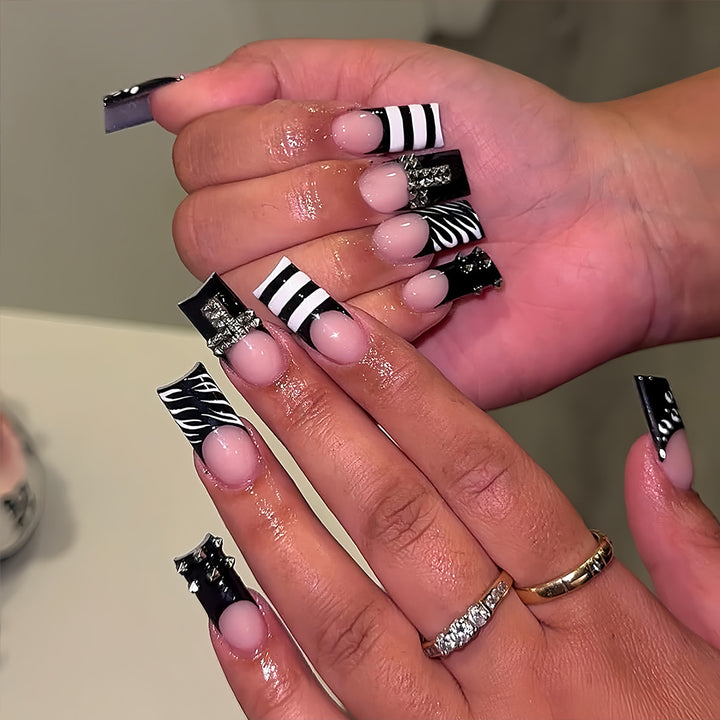 Artificial Nails in Modern Stripe and Zebra Design Stornfield