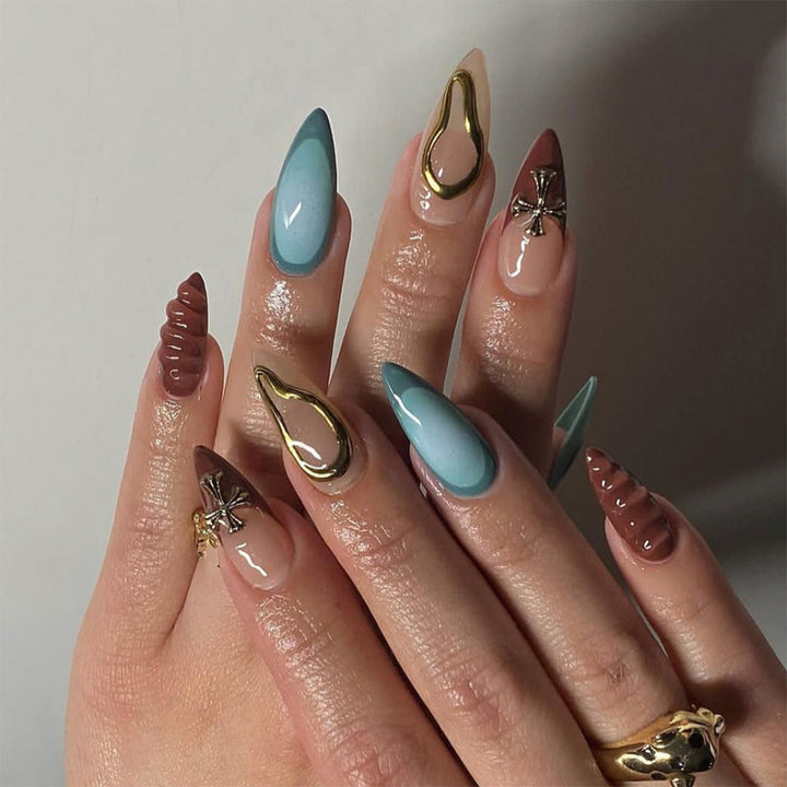 Artful acrylic nails with 3D design and glitter accents Stornfield