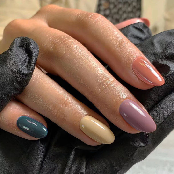 Artful nail extensions with an elegant leaf pattern Stornfield